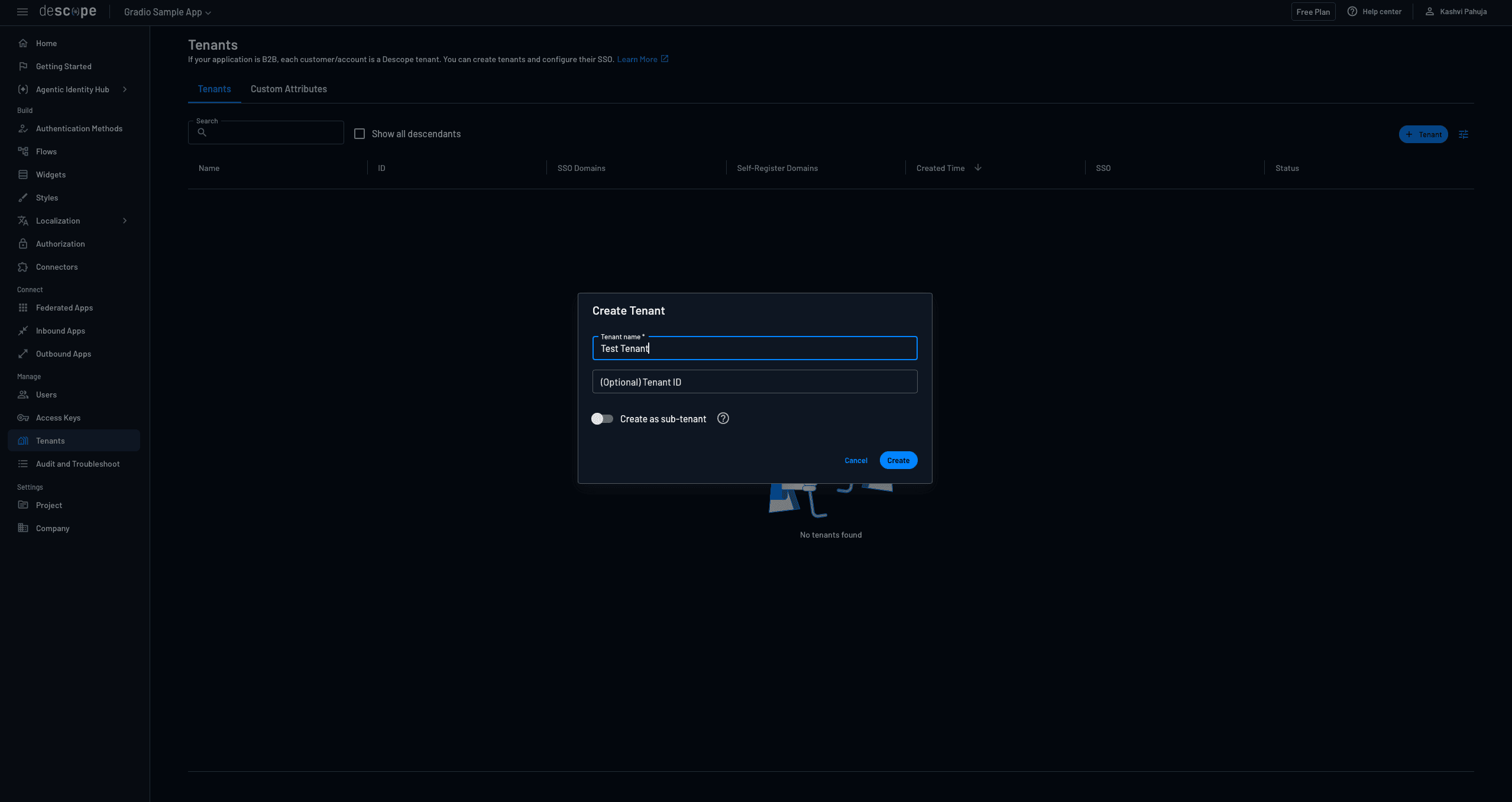 A screenshot of the Descope Console titled Tenants for an application called Gradio Sample App. The interface displays a Tenants page where users can manage customer accounts. A sidebar on the left includes navigation categories such as Build, Styles, Authorization, Connect, Manage, and Settings, with the Tenants option selected under Manage. In the center, a Create Tenant modal window is open over an empty list that shows the text No tenants found. The modal includes a required input field for Tenant name with the text Test Tenant entered, an optional field for Tenant ID, and a toggle to Create as sub-tenant. Buttons at the bottom of the modal allow the user to Cancel or Create. The top navigation bar includes the descope logo on the left and options for Free Plan, Help center, and a user profile for Kashvi Pahuja on the right.